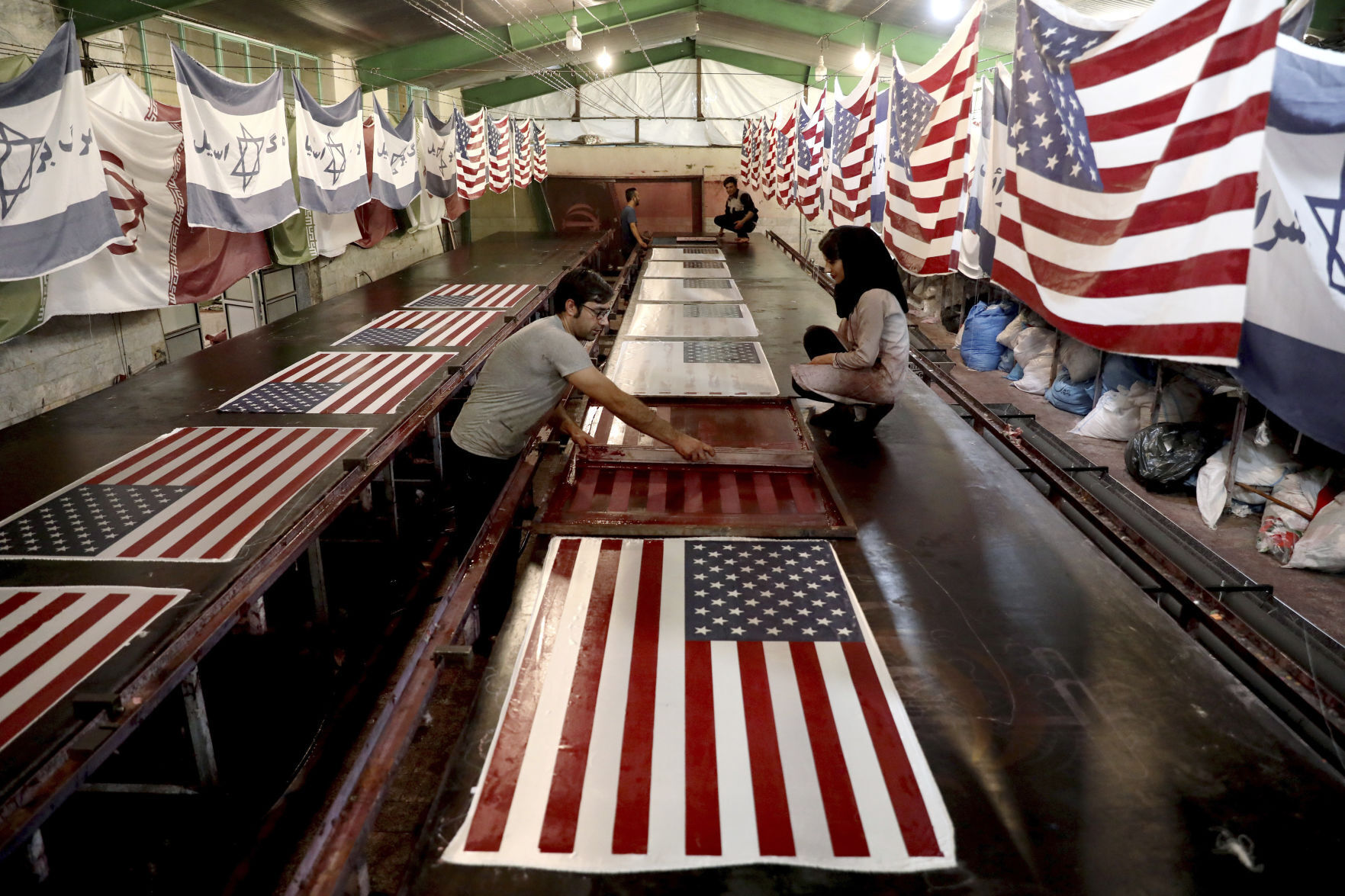 APTOPIX Iran Business of Flag Burning